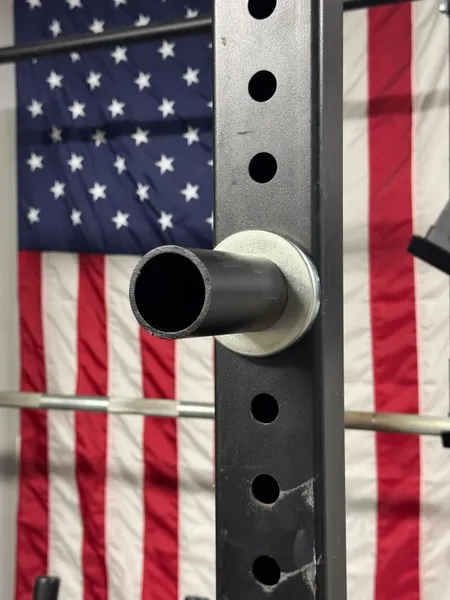 Magnetic Olympic Barbell Change and Micro Plate Storage Peg